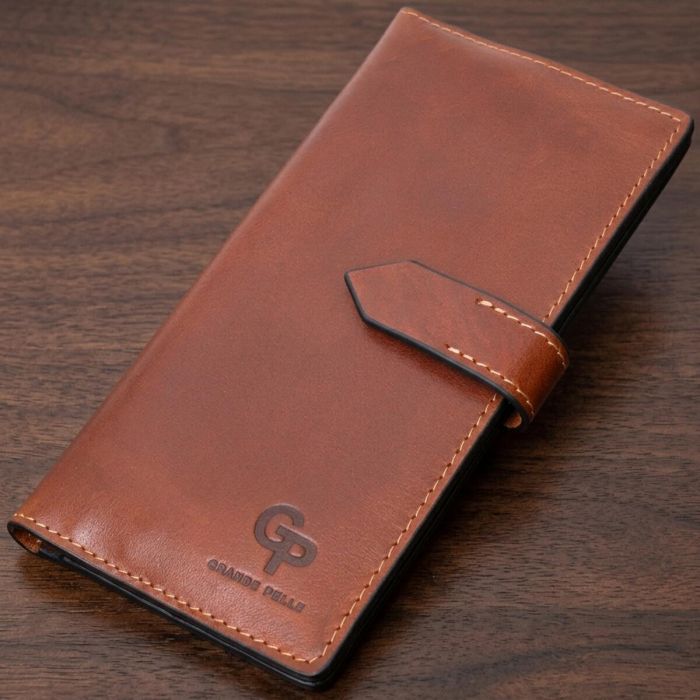 Интересный вертикальный кошелек из натуральной кожи GRANDE PELLE 11660 Коричневый