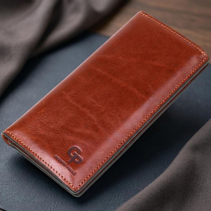 Кожаный вертикальный купюрник GRANDE PELLE 11213 Коричневый