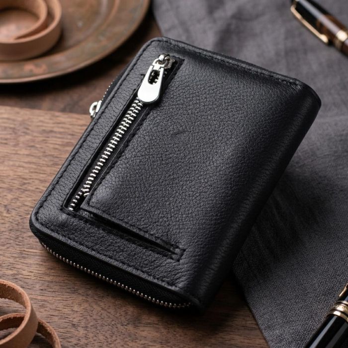 Шкіряний гаманець для жінок на блискавці з тисненим логотипом ST Leather 19489 Чорний