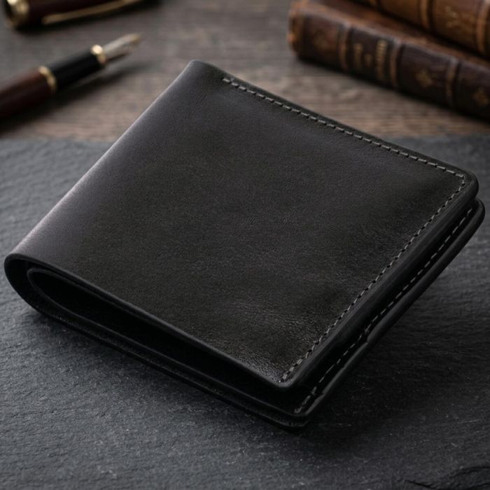 Портмоне вертикальне з круглим магнітом на два відділення GRANDE PELLE 11306 Чорне