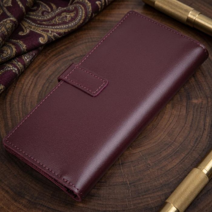 Кожаное глянцевое портмоне GRANDE PELLE 11467 Бордовый